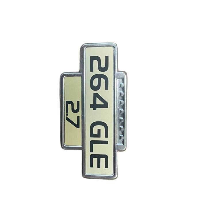 Volvo Embleem 264 2.7 voor op scherm goudkleurige achtergrond Volvo onderdeel nr 1254401