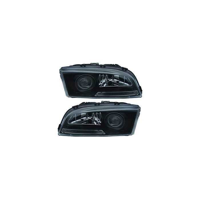 Strålkastare svart styling USA vänster och höger i set VOLVO S70 V70 I -00 set